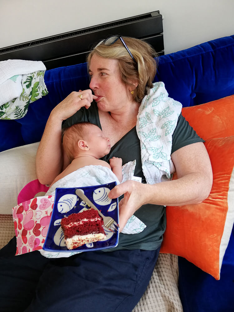 Your Neighbourhood Midwives - Tess with baby and cake
